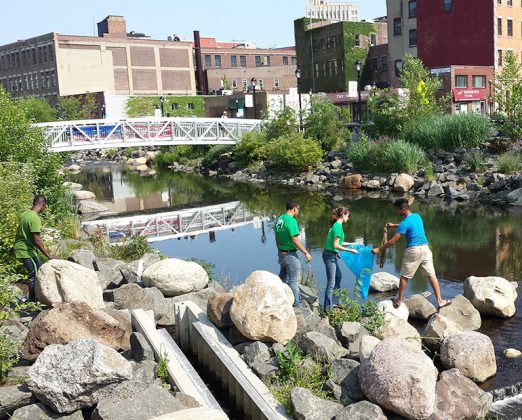 Groundwork Hudson Valley Green Team members participate in a cleanup of the Saw Mill River at the new daylighted Van der Donck Park in downtown Yonkers.