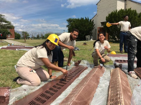 Groundwork Elizabeth Youth leader Adriana Morocho and Green Team members Dionis Ramirez and Jennifer Lam refinish the radiators