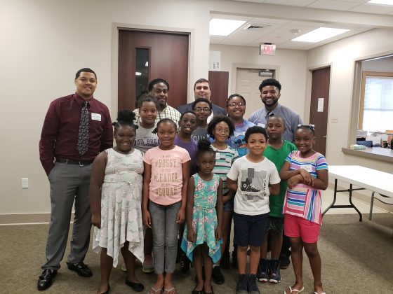 Acadiana Planning Commission staff and youth from neighborhood organizations gather to discuss their vision, dreams, and hopes for the future of Four Corners.